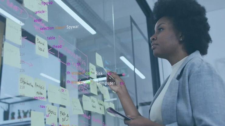 Animation of data processing over african american businesswoman using tablet
