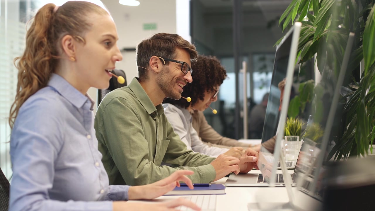 Professional Call Center Agents Providing Customer Support in Office