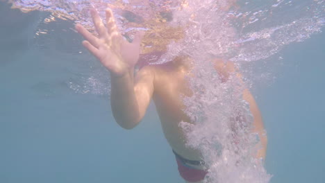 Underwater-footage-of-toddler-bot-snorkelling-and-reach-out-for-his-father's-hand-at-sea-of-Kalamata,Greece