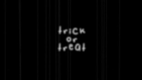 Trick-Or-Treat-text-with-noise-vhs-effect-on-dark-black