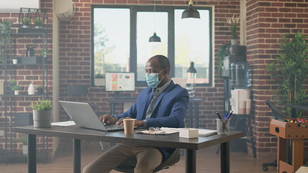 African american businessman analyzing data sales report