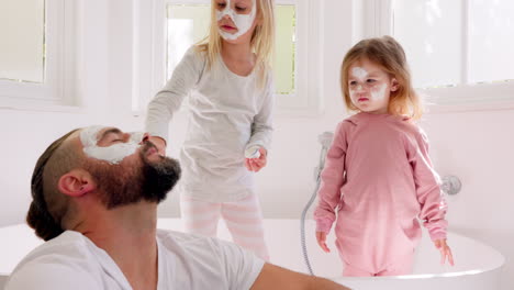 family, father and girls in skincare mask