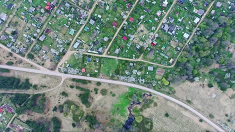 drone moves forward above ječi gardens, cloudy spring weather in south latvia