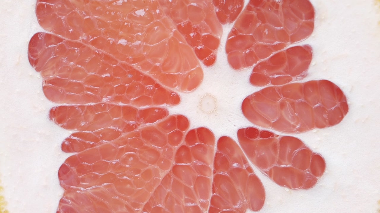 Macro Shot of Juicy Pink Grapefruit Segments