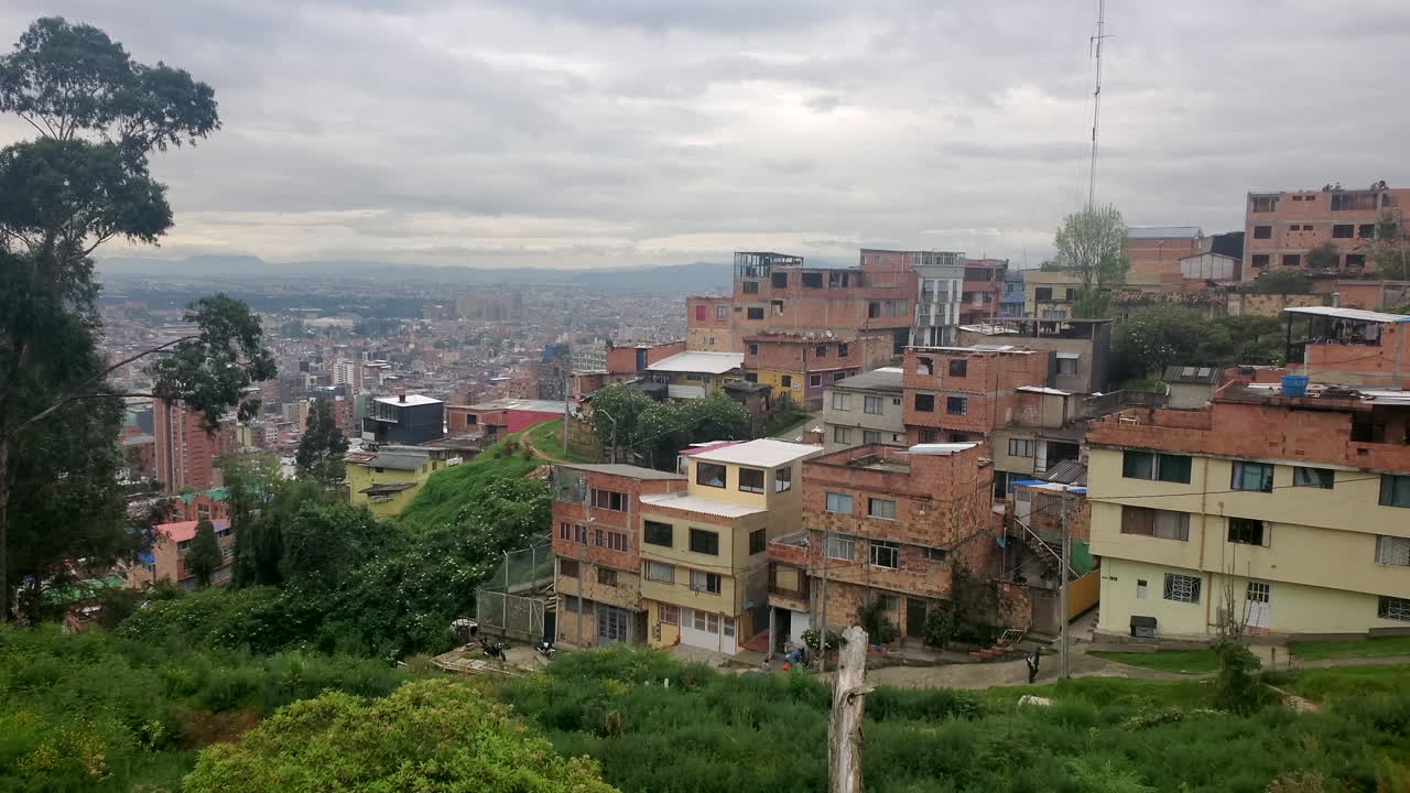 Slums and run down buildings by the Bogota Colombia overlook of the city. 4k day exterior 2