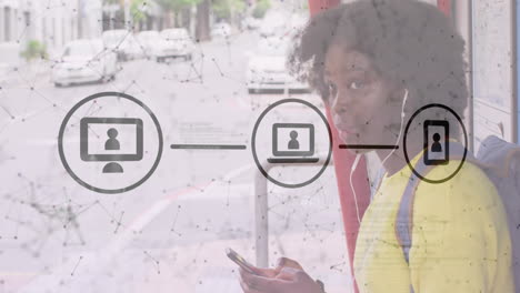 animation of network of connections and media over african american woman using smartphone in city