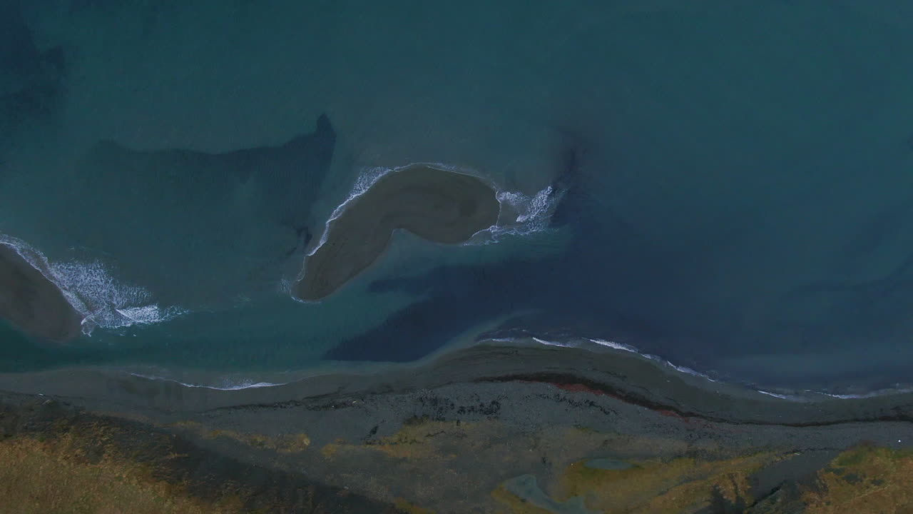 Drone view of the sea from an aerial vantage point near the mountains in Iceland