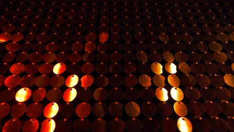 fondo cinético rojo con luces brillantes y relucientes. excelente para guardadores de texto o cg. concepto de vacaciones, celebraciones o fiestas de glamour