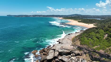 central coast from above: the aerial majesty of spoon bay and wamberal beach's nature reserve, new south wales, australia