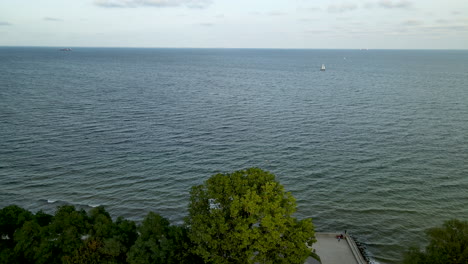 polanka redlowska, poland - wonderful view of the blue calm sea with green trees - aerial shot