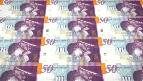 billetes de cincuenta shekels israelíes rodando en la pantalla, dinero en efectivo, bucle