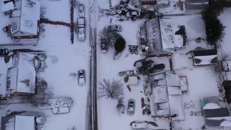 an aerial view of a suburban neighborhood after a heavy nor'easter storm