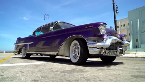 vintage purple cadillac in havana, cuba