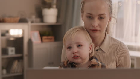 woman with tear-stained toddler