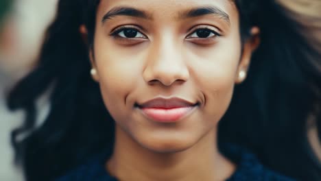 close up portrait of a beautiful smiling young woman