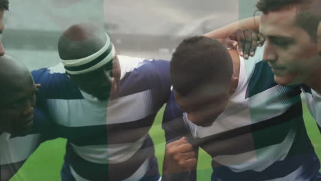 animation of flag of nigeria over diverse male rugby players teaming up at stadium