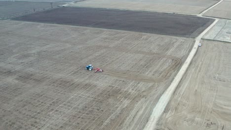 Aerial-view-of-agricultural-lands-that-are-plowed-before-sowing