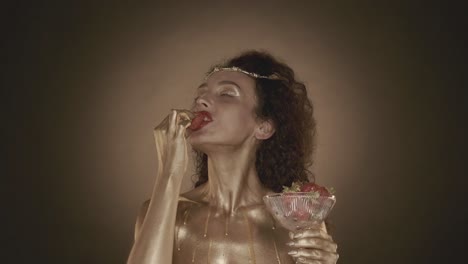 golden goddess with strawberries