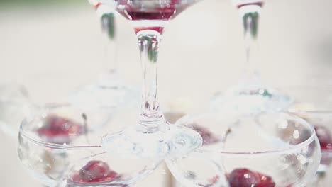 Pyramid-of-glasses-inside-each-glass-is-a-cherry