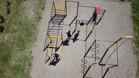 people calisthenic training in outside gym aerial high angle