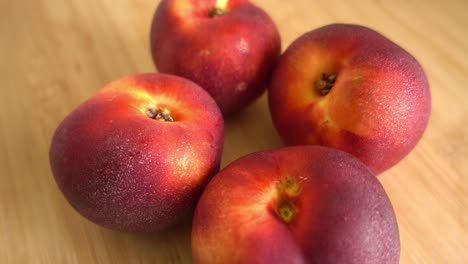 freshly picked ripe peaches rotating