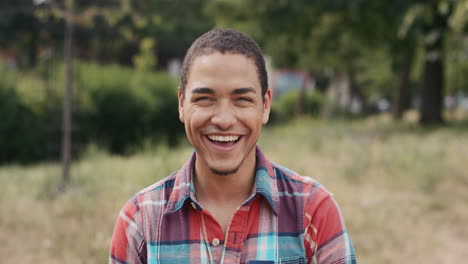 Slow-Motion-Portrait-of-happy-mixed-race-man-laughing