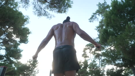 man skipping rope in a park