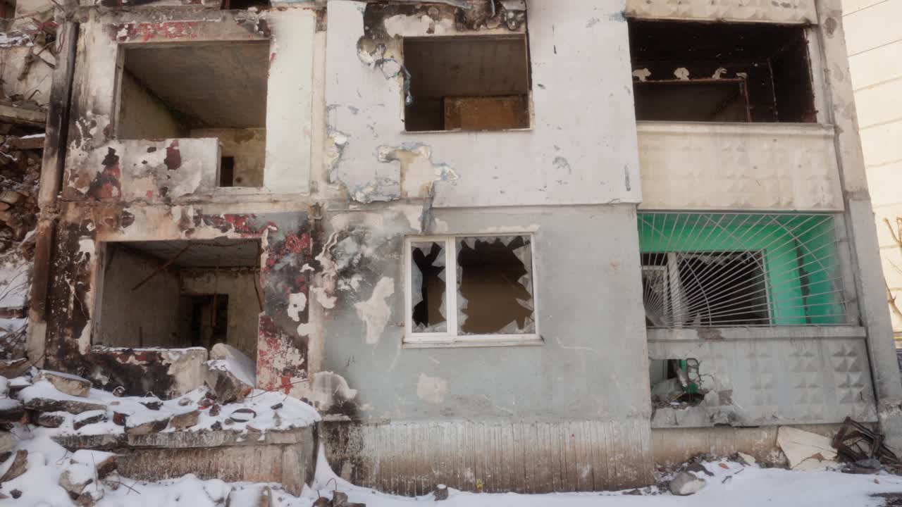 Damaged walls and windows in a residential building after the Russian military attack