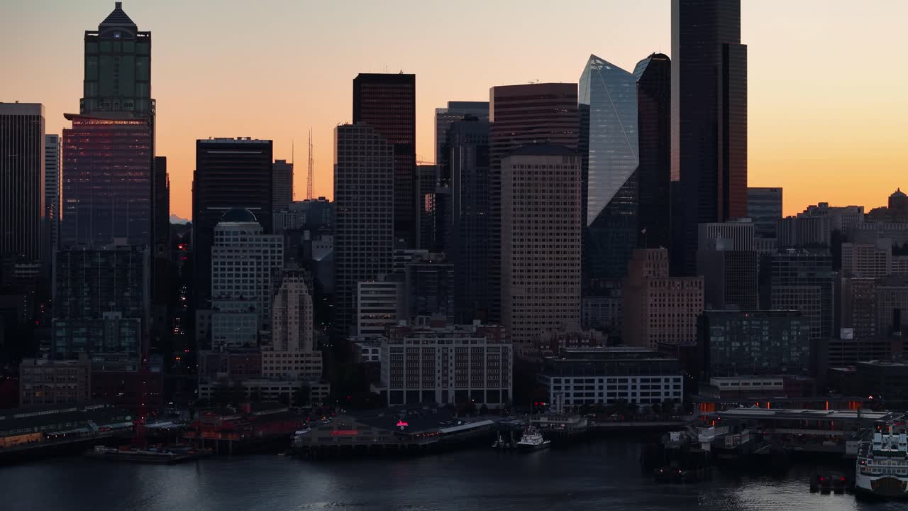 Seattle skyline slides past as the city stirs above Puget Sound