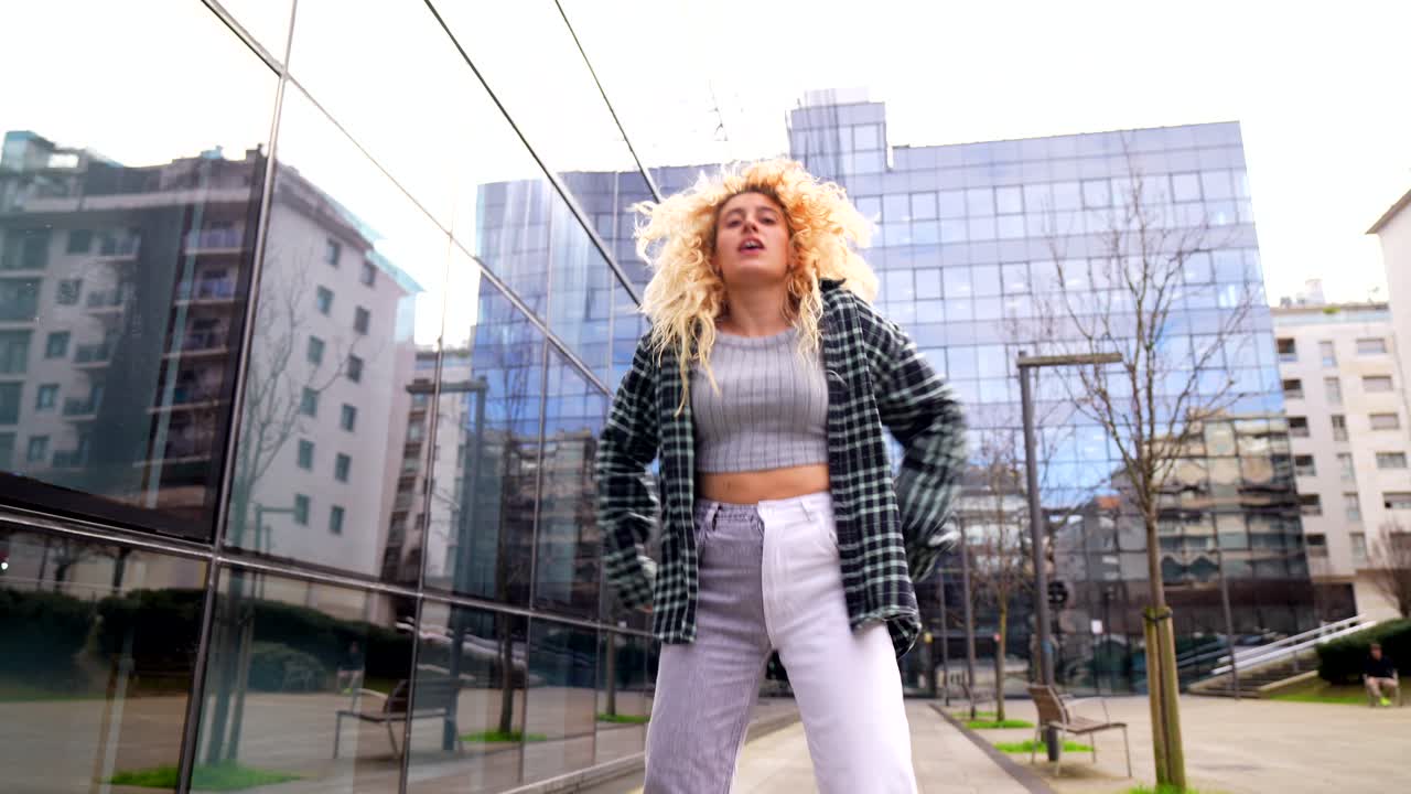 Woman dancing in an urban setting