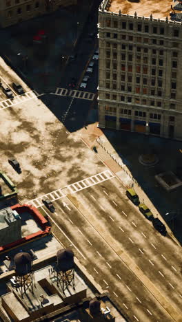 aerial view of a busy city street with cars and buildings