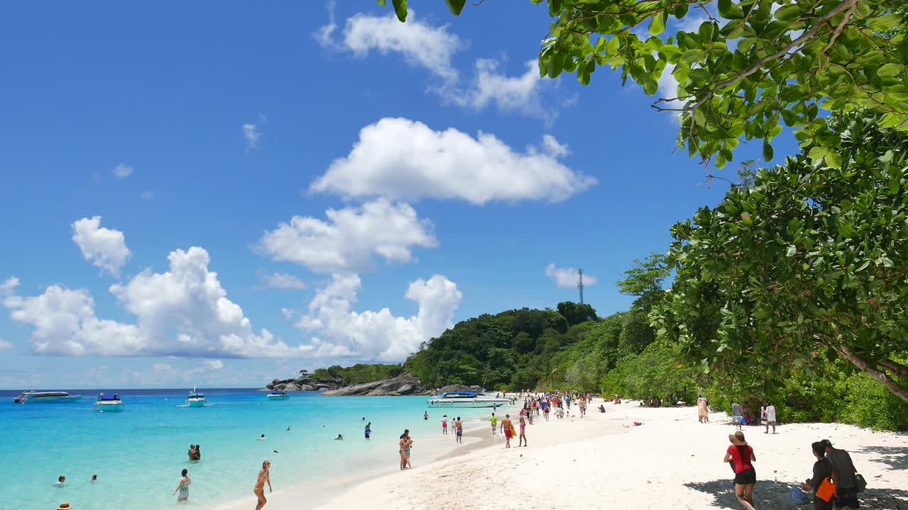 Phuket Thailand - Circa Tourists visiting an island beach