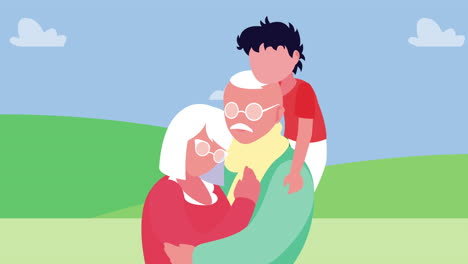 할아버지와 할머니 부부가 캠프에서 손자와 함께 포옹하고 있습니다.