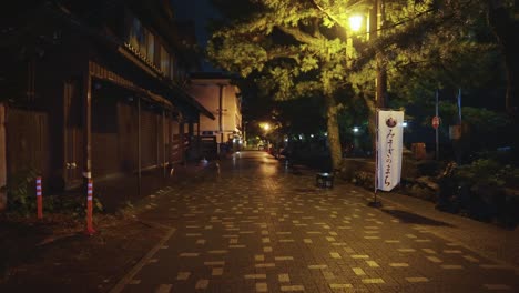 empty street in japanese seaside town at night, peaceful and calm