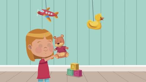 niña jugando con oso de peluche y juguetes