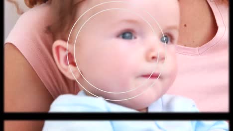 Animation-of-moving-screens-and-geometrical-shapes-over-caucasian-mother-holding-baby