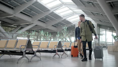 couple waiting for flight at the airport