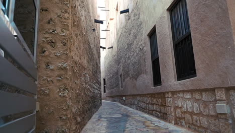 an old street in old dubai located in al fahidi historical neighbourhood, united arab emirates