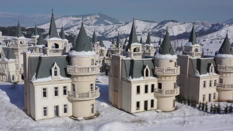 aerial close-up of abandoned fairytale castles burj al babas