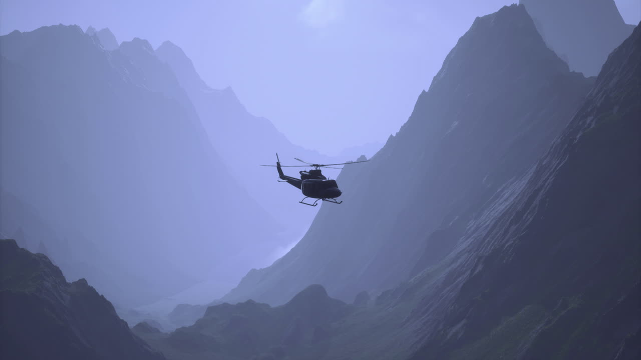 Helicopter flying over majestic mountain range during early morning hours