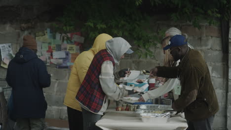 community volunteers distribute food to people in need
