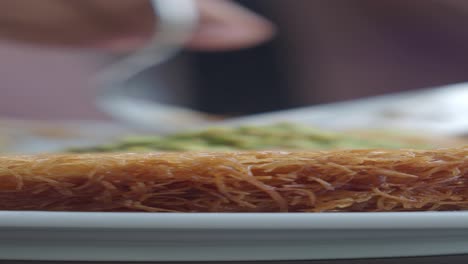 close up of kunafa with pistachios