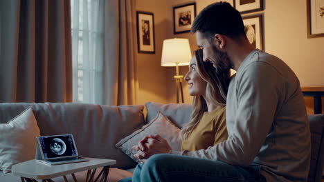 couple viewing ultrasound image