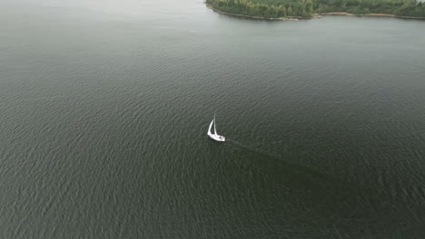 sailboat cruising on north sea during autumn in finland