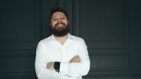 gentleman posing in studio. portrait of stylish handsome man with beard in studio