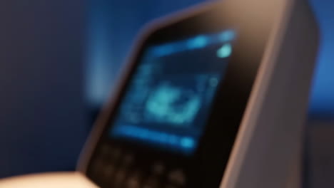 modern medical device with digital display showing complex data