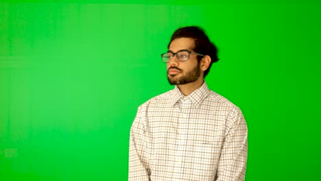 Indian-guy-express-emotion-with-green-background-green-screen