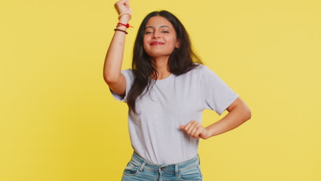 Happy-Indian-woman-listening-music-dancing-disco-having-fun-relaxing-on-party-making-funny-moves