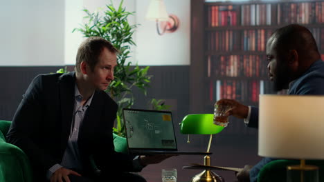 cia agency manager presenting the satellite surveillance data on his pc
