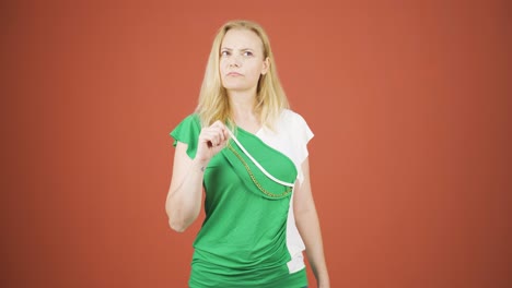 Thoughtful-woman-towards-camera-comes-up-with-an-idea.